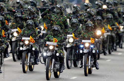 Sri Lanka's Special Task Force members ride bikes at the parade during Sri  Lanka's 71st Independence day celebrations in Colombo - Buy this stock  photo and explore similar images at Adobe Stock |